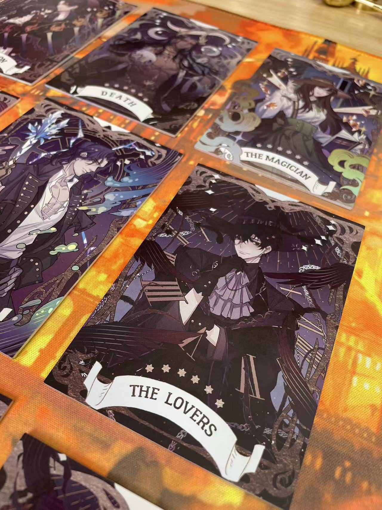 Lord of the Mysteries Paradox Starry Raven tarot card set Lovers Death Hierophant and Magician card close-up