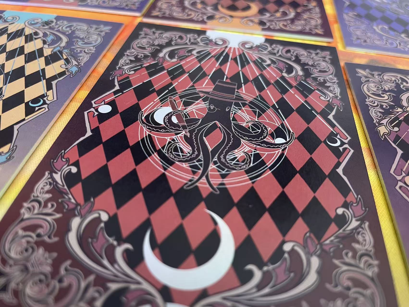 Lord of the Mysteries Paradox Starry Raven tarot card set red card back pattern close-up